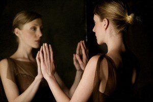 Woman Looking at Reflection