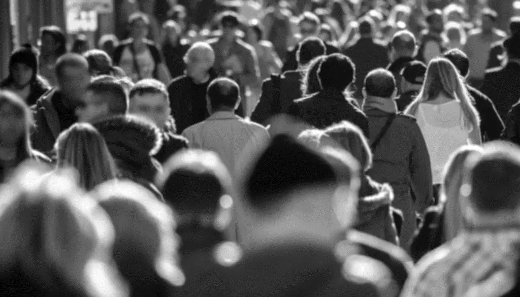 Anonymous crowd walking on a street in New York
